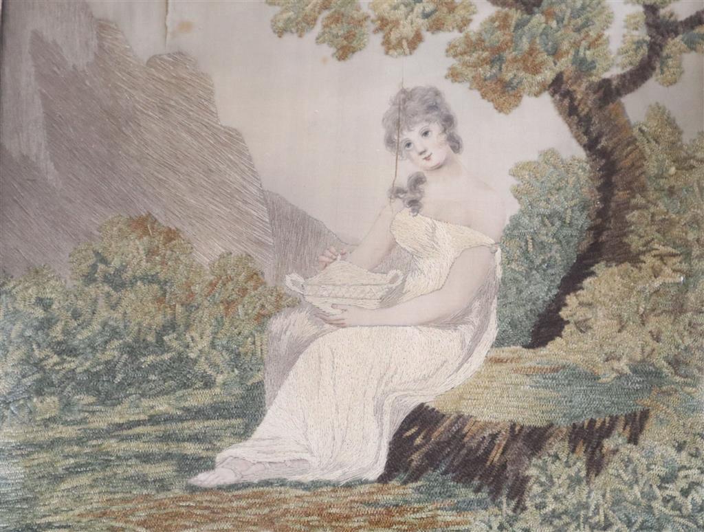 A Regency silkwork panel of a lady in a garden, width 25cm height 23cm